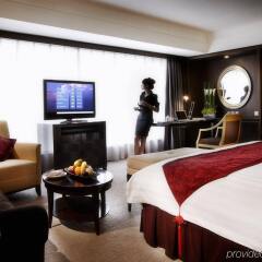 V-Continent Parkview Wuzhou Hotel комната для гостей