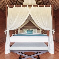 Отель The Pavilions Bali сейф в номере