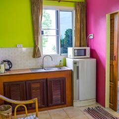 Отель Chez Charly Bungalow в номере