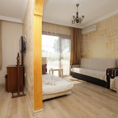Апартаменты Camelot Apartment комната для гостей фото 2