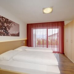 Отель Residence Amelia Тироло комната для гостей фото 2