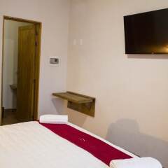 Hotel Puerta San Pedro сейф в номере