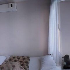 Отель Villa Vongole Чешме сейф в номере