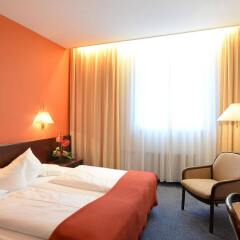Отель Ringhotel Loews Merkur Германия, Нюрнберг - отзывы, цены и фото номеров - забронировать отель Ringhotel Loews Merkur онлайн комната для гостей фото 3
