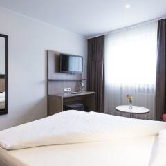 Отель Astor & Aparthotel Германия, Кёльн - отзывы, цены и фото номеров - забронировать отель Astor & Aparthotel онлайн комната для гостей