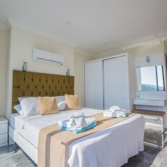 Villa Almeria 2 by Akdenizvillam Турция, Калкан - отзывы, цены и фото номеров - забронировать отель Villa Almeria 2 by Akdenizvillam онлайн комната для гостей фото 5