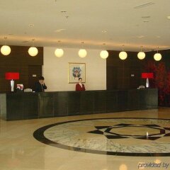 Отель Zhuhai Sunshine Airport Hotel Китай, Чжухай - отзывы, цены и фото номеров - забронировать отель Zhuhai Sunshine Airport Hotel онлайн интерьер отеля