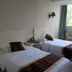 Апартаменты Yelinyuan Holiday Apartments комната для гостей фото 2