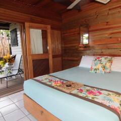 Отель Coconut Grove Beachfront Cottages комната для гостей фото 2