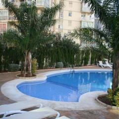 Отель Apartamentos Esmeralda Suites бассейн