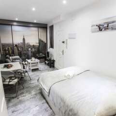 Апартаменты Forever Young Apartments Mediodia комната для гостей фото 2