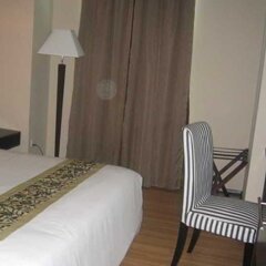 Tat Place Hotel in Kuala Belait, Brunei from 95$, photos, reviews - zenhotels.com guestroom
