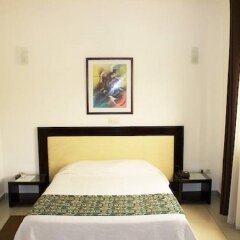 Hotel le Pelican in Lome, Togo from 84$, photos, reviews - zenhotels.com guestroom photo 3
