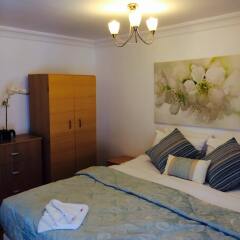 Апартаменты Wellington Road Apartments комната для гостей фото 3