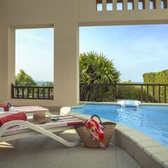 Отель The Cove Rotana Resort бассейн фото 2