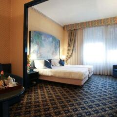 Отель IH Hotels Milano Ambasciatori 4* Улучшенный номер с различными типами кроватей фото 10
