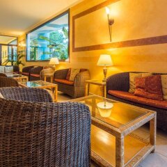 Отель UNAHOTELS Naxos Beach Sicilia Италия, Джардини Наксос - 1 отзыв об отеле, цены и фото номеров - забронировать отель UNAHOTELS Naxos Beach Sicilia онлайн интерьер отеля