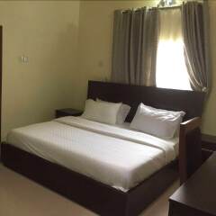 Отель Paconsu Suites Нигерия, Калабар - отзывы, цены и фото номеров - забронировать отель Paconsu Suites онлайн вид на фасад