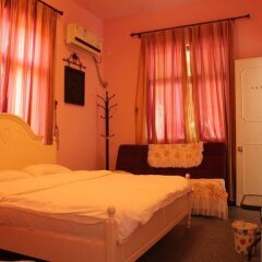 Отель Lin Hai Yard Inn Сямынь сейф в номере