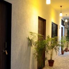 Отель Kalpana Yoga Homestay Номер Делюкс с различными типами кроватей фото 4