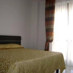 Отель Residence Monte Grappa Италия, Кальяри - отзывы, цены и фото номеров - забронировать отель Residence Monte Grappa онлайн комната для гостей фото 4