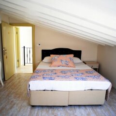 Kandira Butik Hotel Чешме сейф в номере