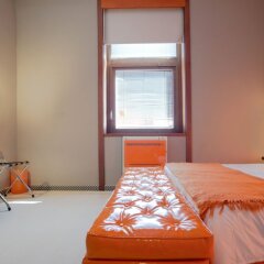 Orange Hotel комната для гостей фото 3