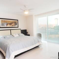 Отель Amara Cancun Beachfront Condos Мексика, Канкун - отзывы, цены и фото номеров - забронировать отель Amara Cancun Beachfront Condos онлайн комната для гостей фото 2