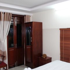 Отель Windy River Homestay сейф в номере