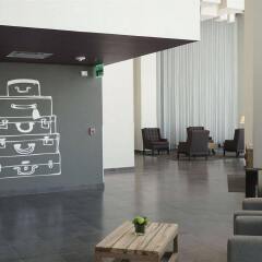 Отель City Express Plus Patio Universidad интерьер отеля