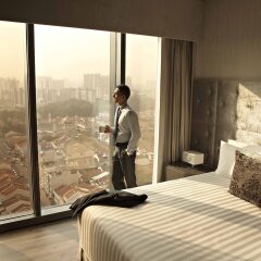Отель Pan Pacific Serviced Suites Beach Road, Singapore фитнесс-зал