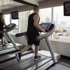 Отель Jumeira Rotana фитнесс-зал фото 4