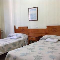 Отель Hostal Nilo сейф в номере