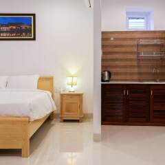 Отель Riverside White House Villa в номере