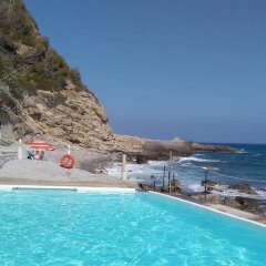 Hotel Le Rocce Del Capo Оспедалетти бассейн