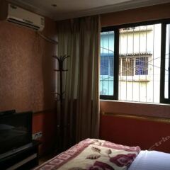 Xinyi Business Hostel комната для гостей