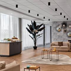 Отель Renaissance Amsterdam Schiphol Airport Hotel Нидерланды, Аалсмеер - отзывы, цены и фото номеров - забронировать отель Renaissance Amsterdam Schiphol Airport Hotel онлайн интерьер отеля фото 2