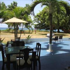 Отель By The Sea Vacation Home And Villa питание