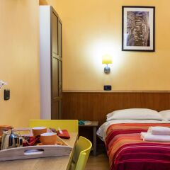 Отель Cesare Balbo Inn в номере