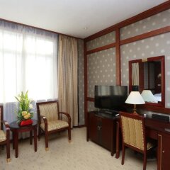 Отель Sunjoy Inn удобства в номере