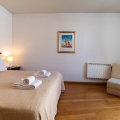 Апартаменты Chiado Apartments Лиссабон комната для гостей фото 4