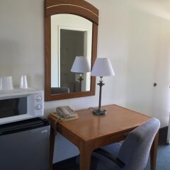 Отель 99 Palms Inn & Suites удобства в номере фото 2