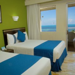 Отель Aquamarina Beach Resort Мексика, Канкун - отзывы, цены и фото номеров - забронировать отель Aquamarina Beach Resort онлайн комната для гостей фото 4