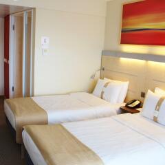 Отель Holiday Inn Express Zurich Airport Швейцария, Рюмланг - 1 отзыв об отеле, цены и фото номеров - забронировать отель Holiday Inn Express Zurich Airport онлайн комната для гостей