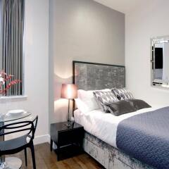 Апартаменты Valet Apartments Golden Square комната для гостей фото 5