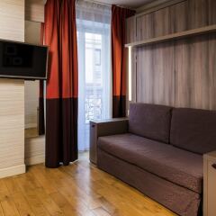 Отель Aparthotel Adagio Paris Opéra сейф в номере