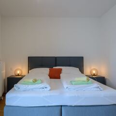 Апартаменты FeelGood Apartments Seestadt Green Living Вена сейф в номере