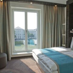 Отель Motel One Salzburg-Mirabell Зальцбург комната для гостей