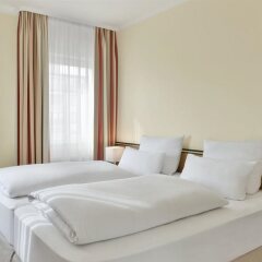 Отель Nh Muenchen City Sud Мюнхен комната для гостей фото 4
