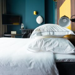 Апартаменты De Jonker Urban Studio's & Suites сейф в номере